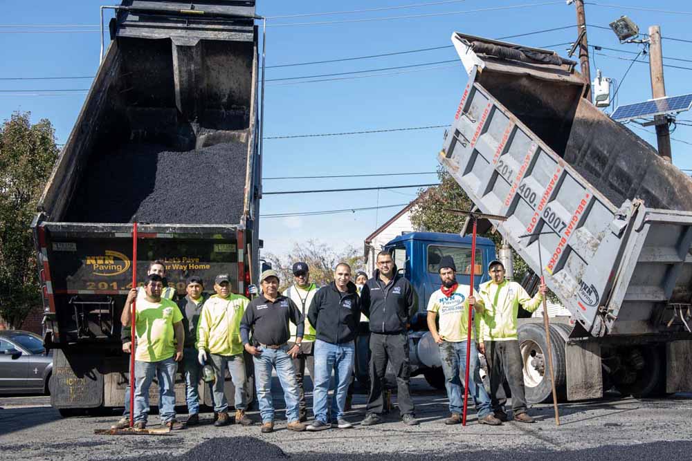 NVN crew with hauling trucks behind them